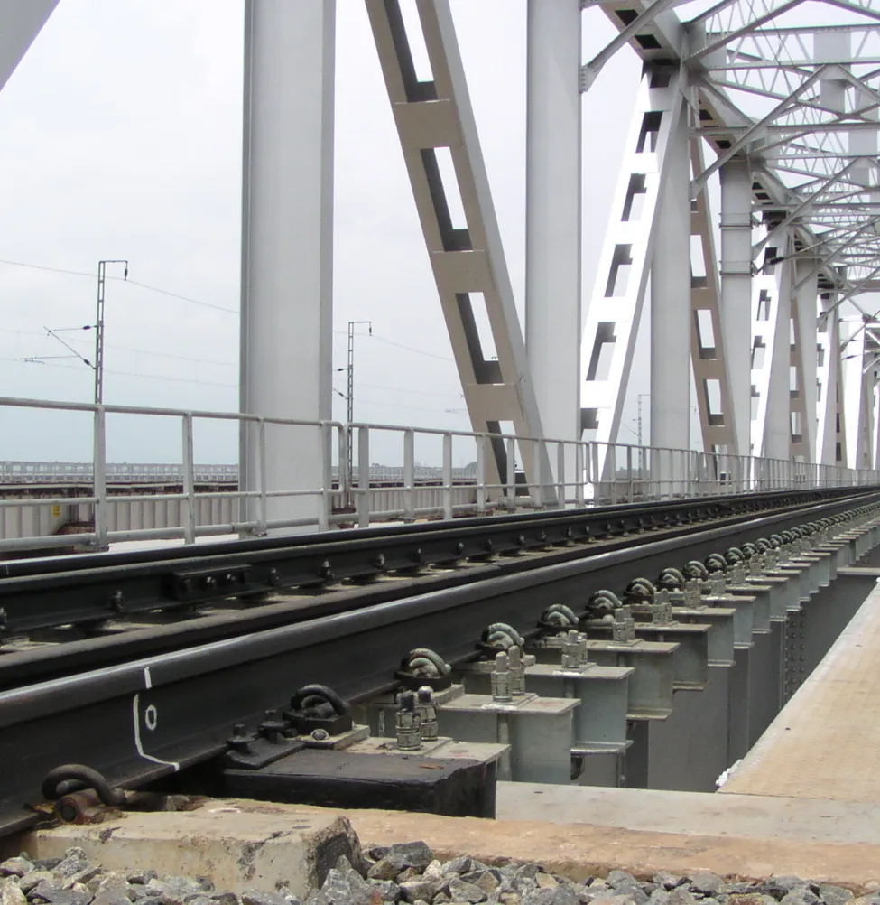 Railway track fasteners and steel track sleeper